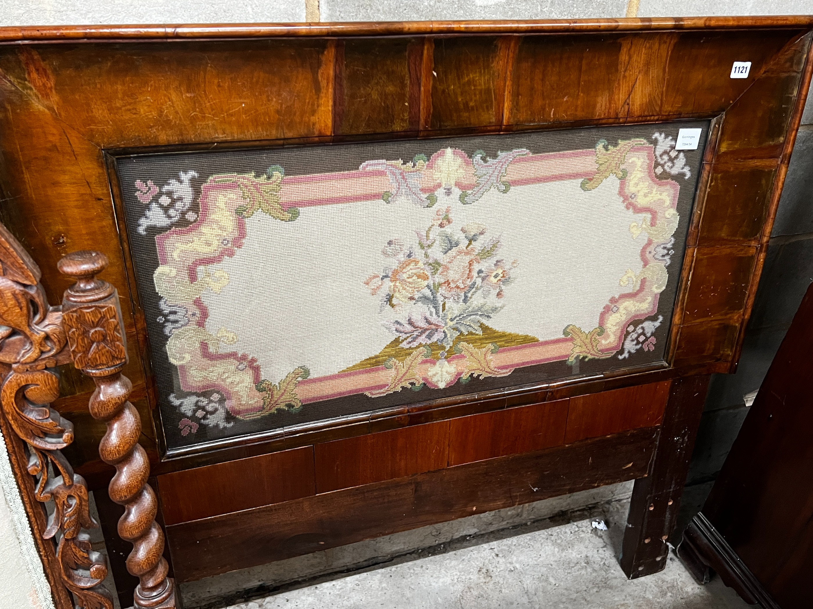 A Victorian rectangular walnut framed headboard with a floral tapestry panel, height 113cm